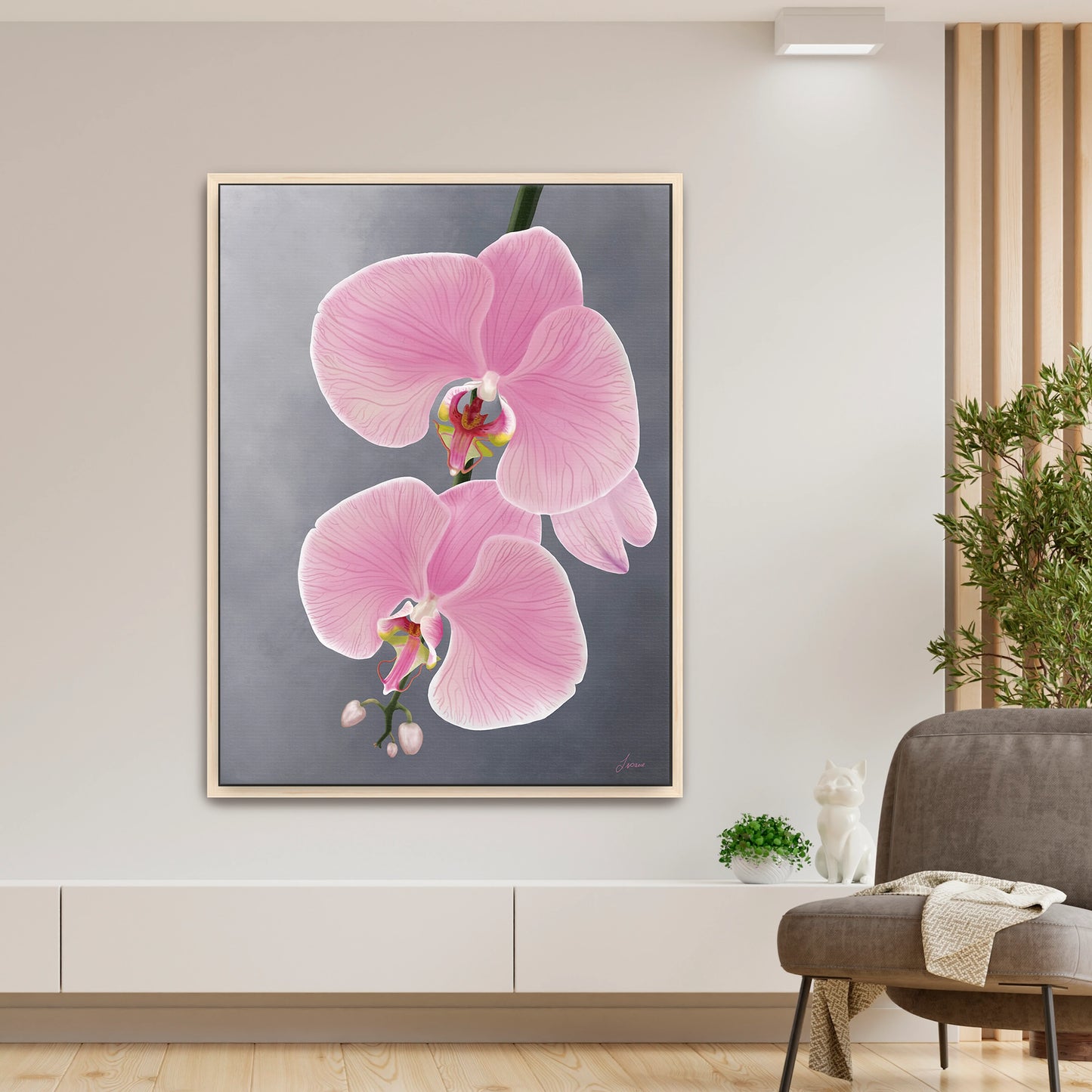 Modern living room featuring a delicate pink orchid canvas art by Lisane Art, with graceful blooms gently reaching toward the left against a soft grey background- framed in natural maple wood for a warm, refined look.