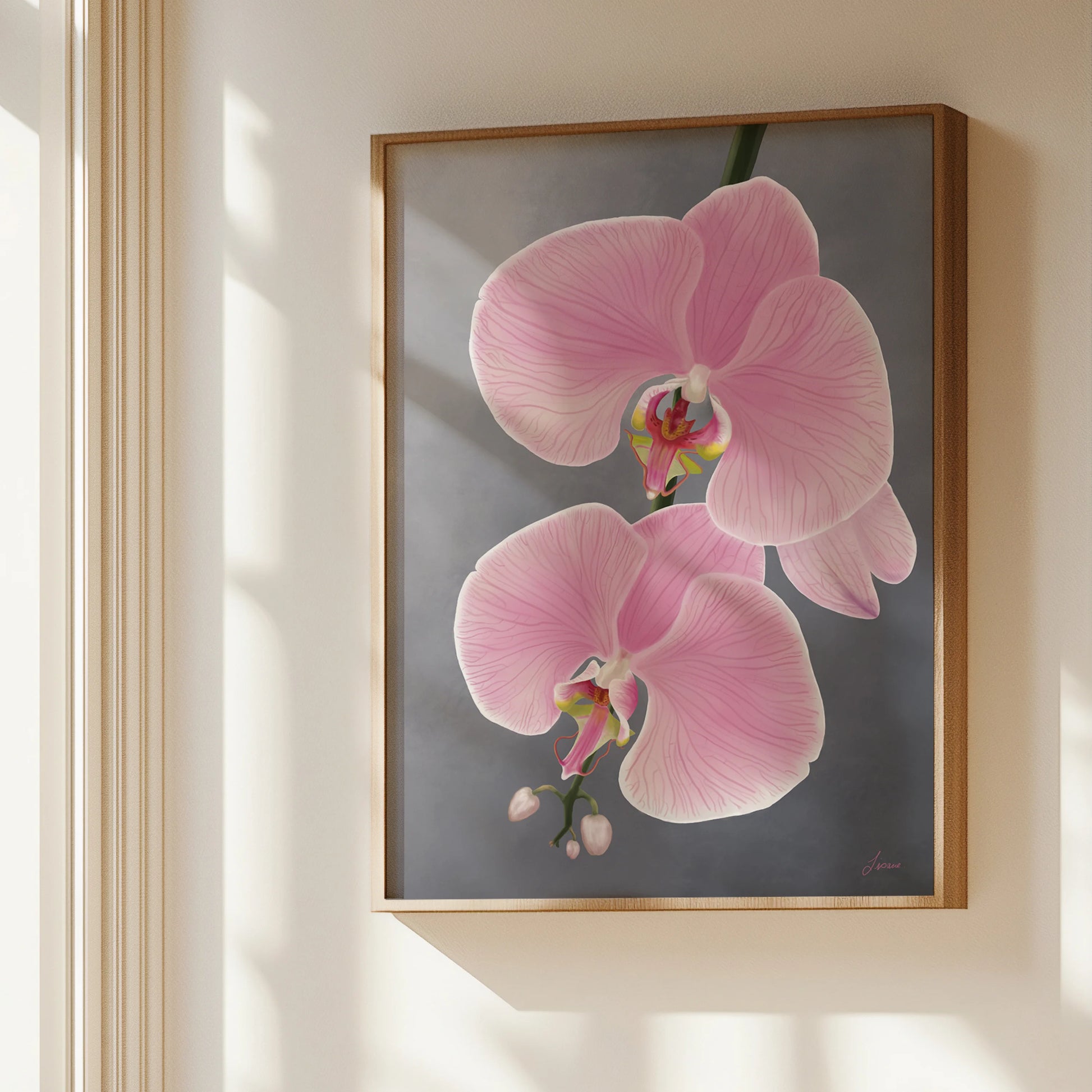 A framed painting of a pink orchid flower with delicate petals hangs on a beige wall. Sunlight from a nearby window casts soft shadows, highlighting the realistic floral artwork and enhancing modern interior styles.