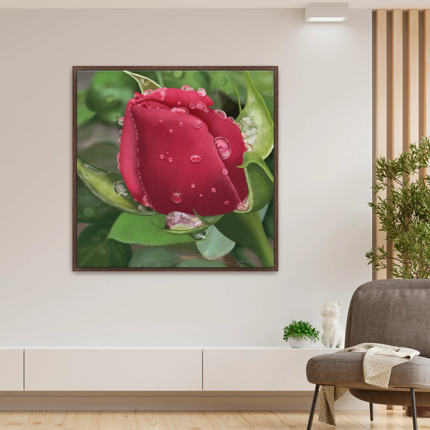 Modern living room featuring a vivid red rose canvas art by Lisane Art, adorned with glistening raindrops against a softly blurred leafy green background - framed in a deep espresso floating frame, adding rich sophistication.