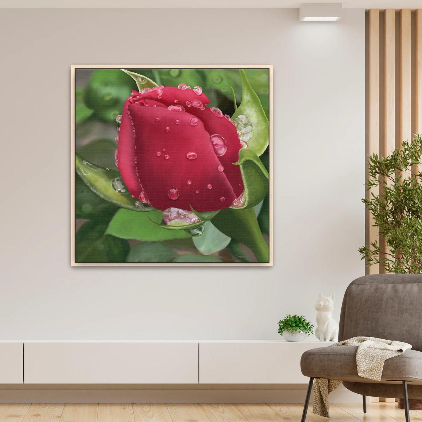 Modern living room featuring a vivid red rose canvas art by Lisane Art, adorned with glistening raindrops against a softly blurred leafy green background - framed in natural maple wood for a warm, organic touch.