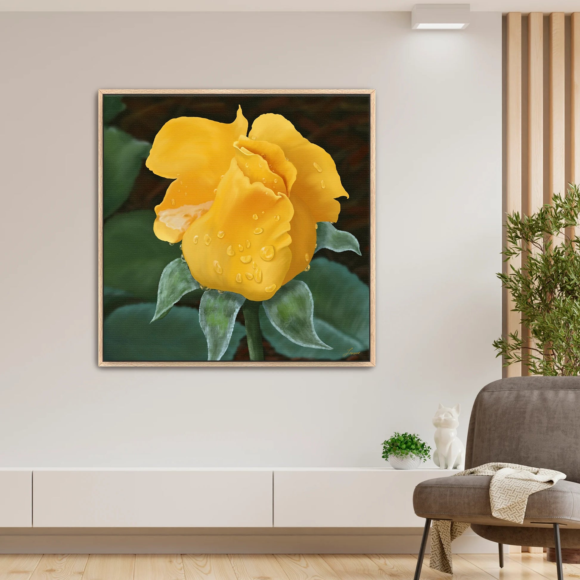 Modern living room showcasing a lively yellow rose canvas art by Lisane Art, sparkling with raindrops and surrounded by lush green foliage - set in a rich oak floating frame, blending nature and elegance.