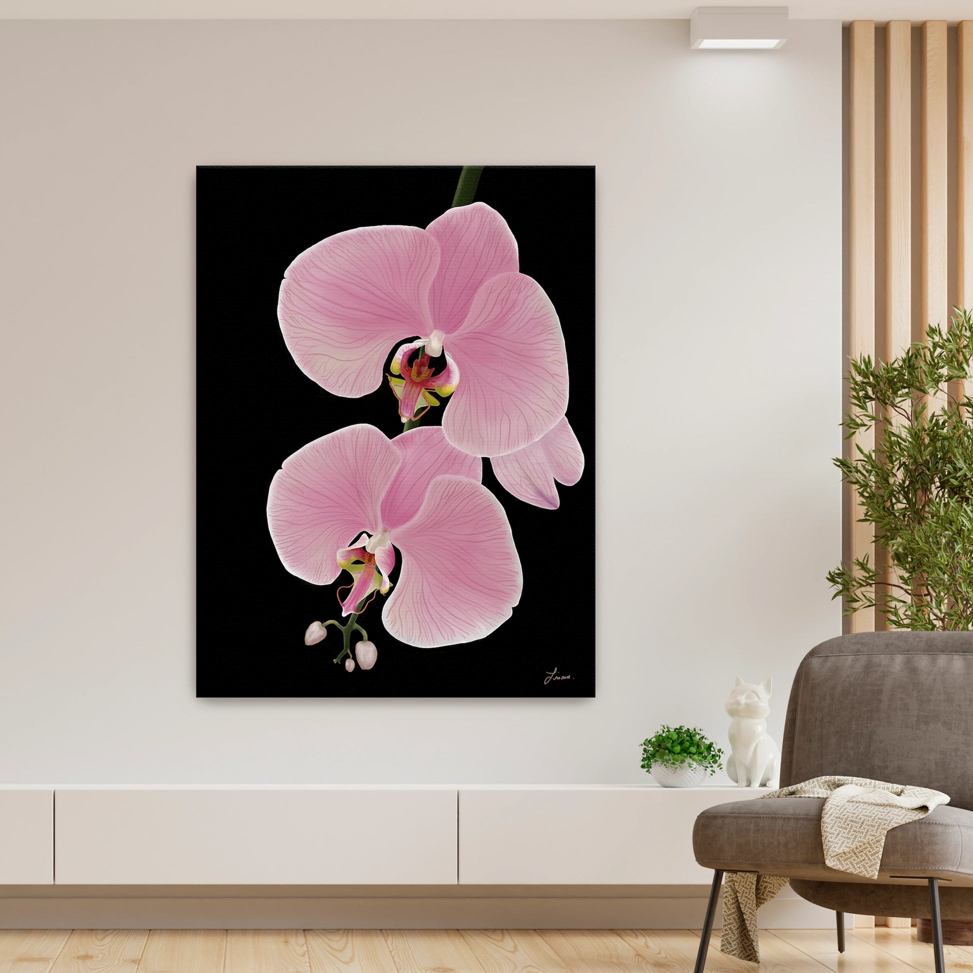Modern living room styled with a striking pink orchid canvas art by Lisane Art, with radiant blooms reaching to the left against a bold black background - displayed as a gallery-wrapped unframed canvas.