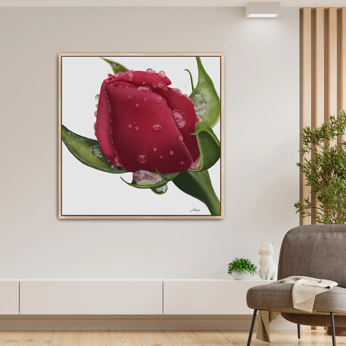 Bright, modern living space showcasing a vibrant red rose canvas art by Lisane Art, kissed by raindrops and glowing against a clean white background - set in a rich oak floating frame, blending nature and elegance.
