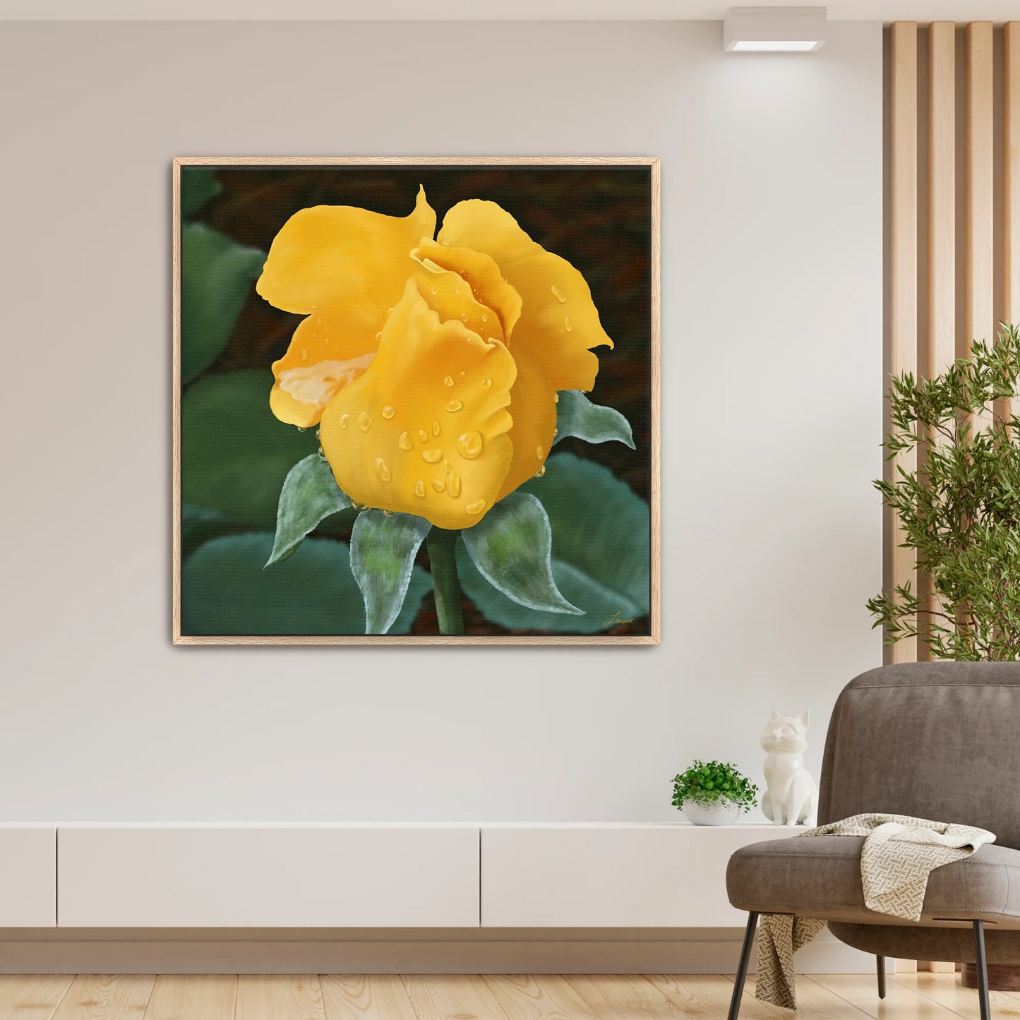 Modern living room showcasing a lively yellow rose canvas art by Lisane Art, sparkling with raindrops and surrounded by lush green foliage - set in a rich oak floating frame, blending nature and elegance. 