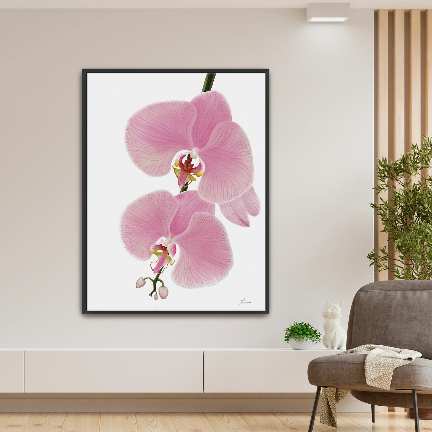Fresh, modern living space showcasing a vibrant pink orchid canvas art by Lisane Art, with blossoms flowing leftward against a clean white background - enclosed in a sleek black floating frame. 