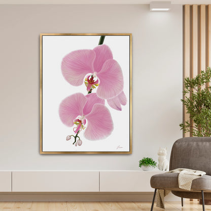 Fresh, modern living space showcasing a vibrant pink orchid canvas art by Lisane Art, with blossoms flowing leftward against a clean white background - elegantly framed in a luxurious gold floating frame. 