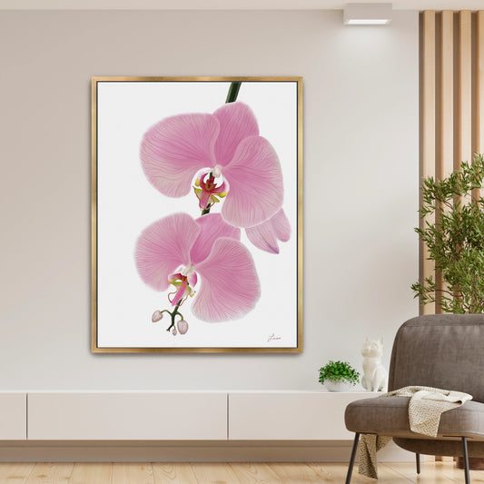 Fresh, modern living space showcasing a vibrant pink orchid canvas art by Lisane Art, with blossoms flowing leftward against a clean white background - elegantly framed in a luxurious gold floating frame. 