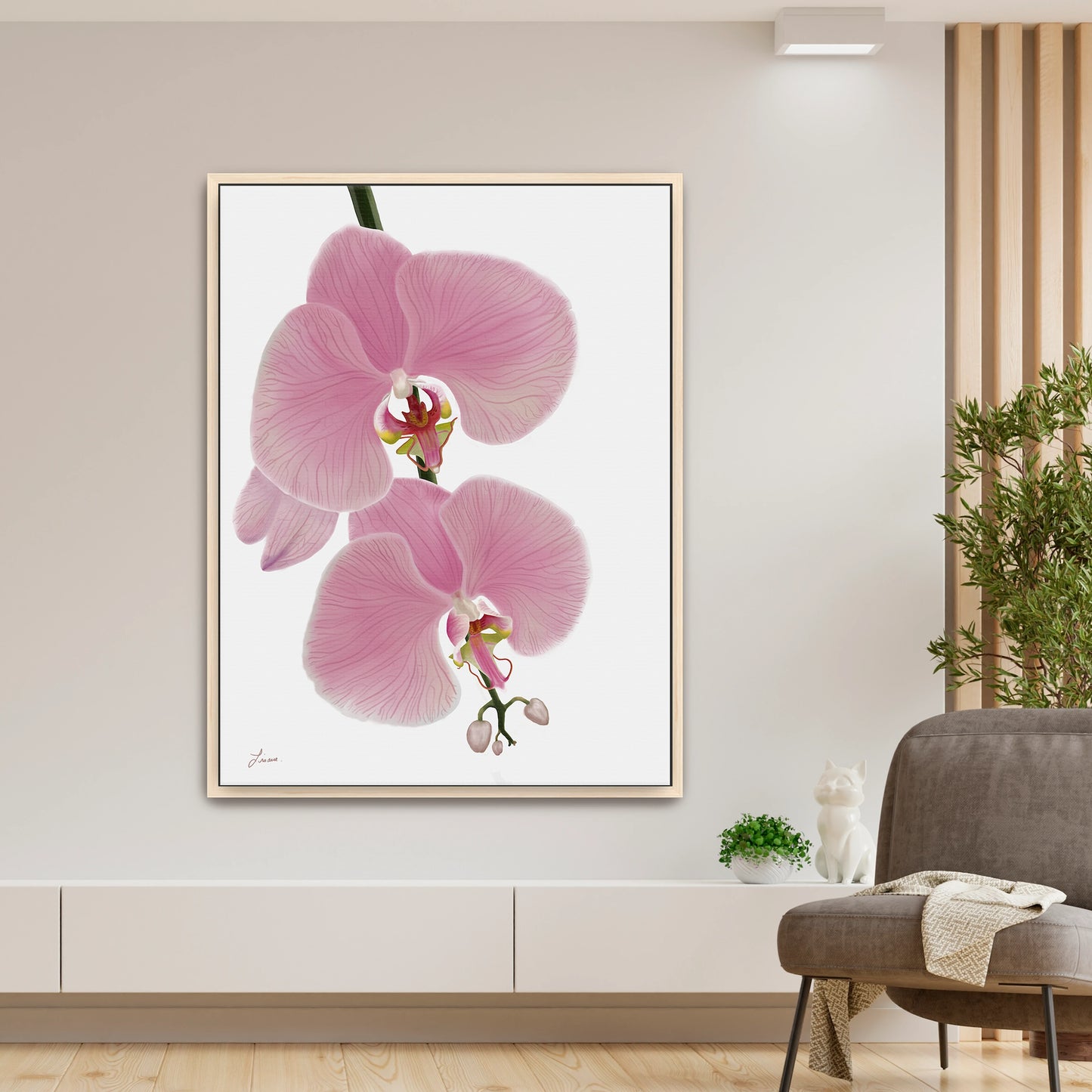 Fresh, modern living space showcasing a vibrant pink orchid canvas art by Lisane Art, with blossoms flowing rightward against a clean white background - framed in natural maple wood for a warm, refined look. 