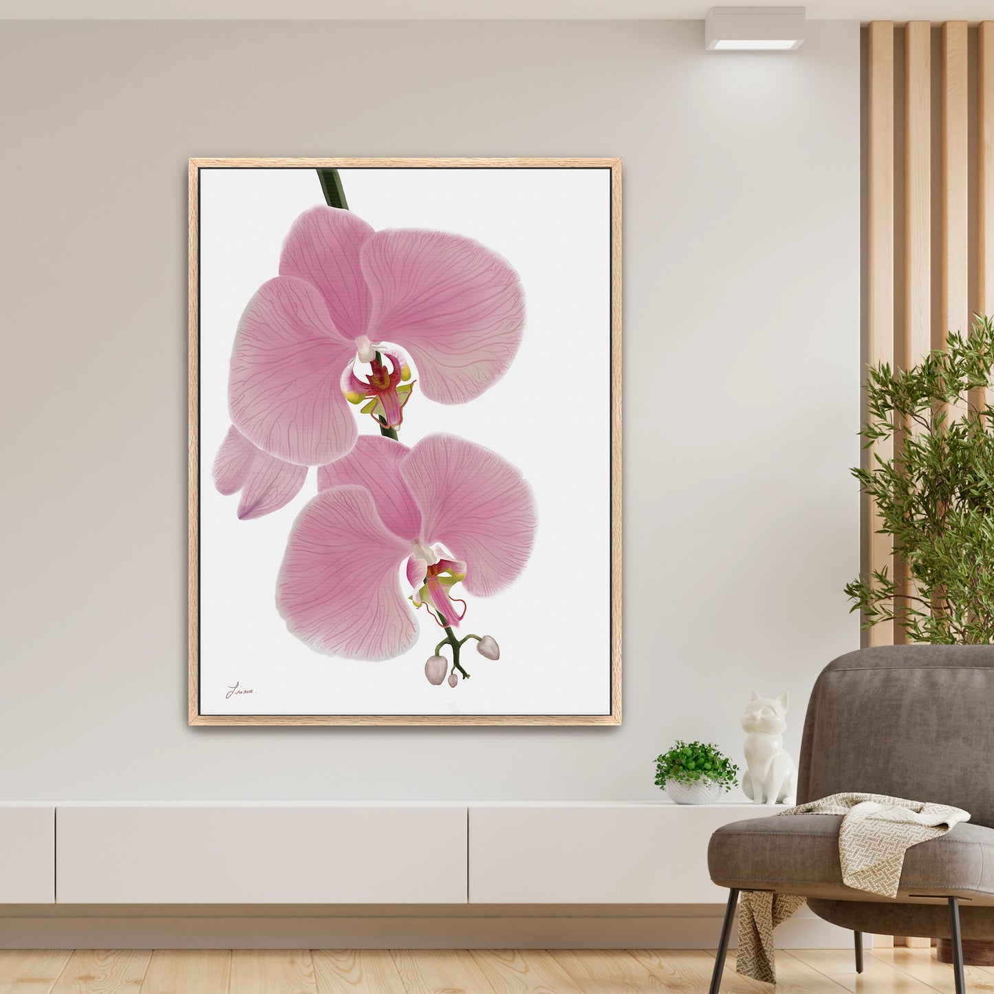 Fresh, modern living space showcasing a vibrant pink orchid canvas art by Lisane Art, with blossoms flowing rightward against a clean white background - set in a rich oak frame for timeless elegance.